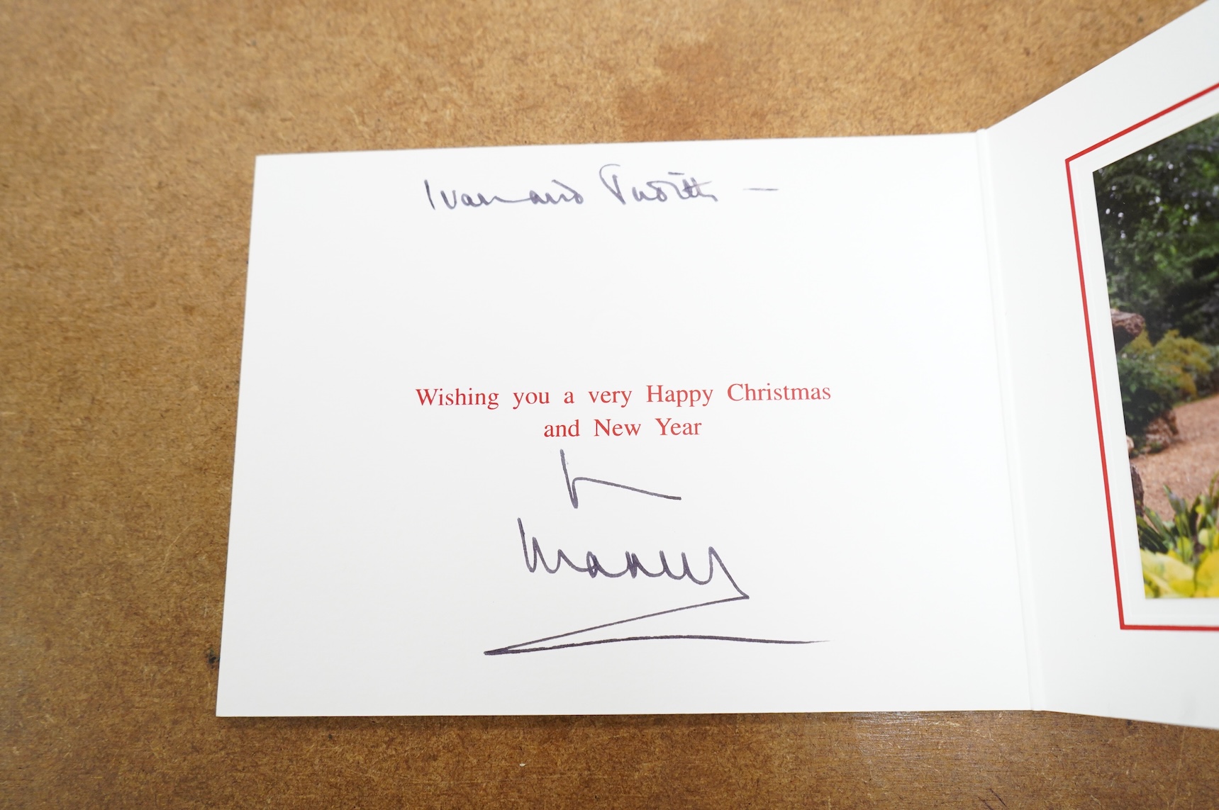 Royal interest; a Christmas card (2002) signed by King Charles